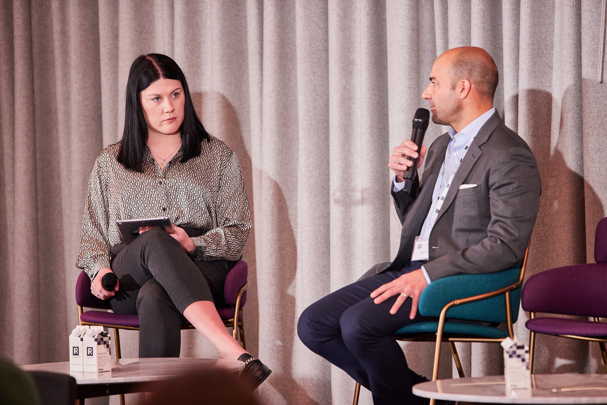 IR Magazine's Lauren McDonald with Grant Bartucci